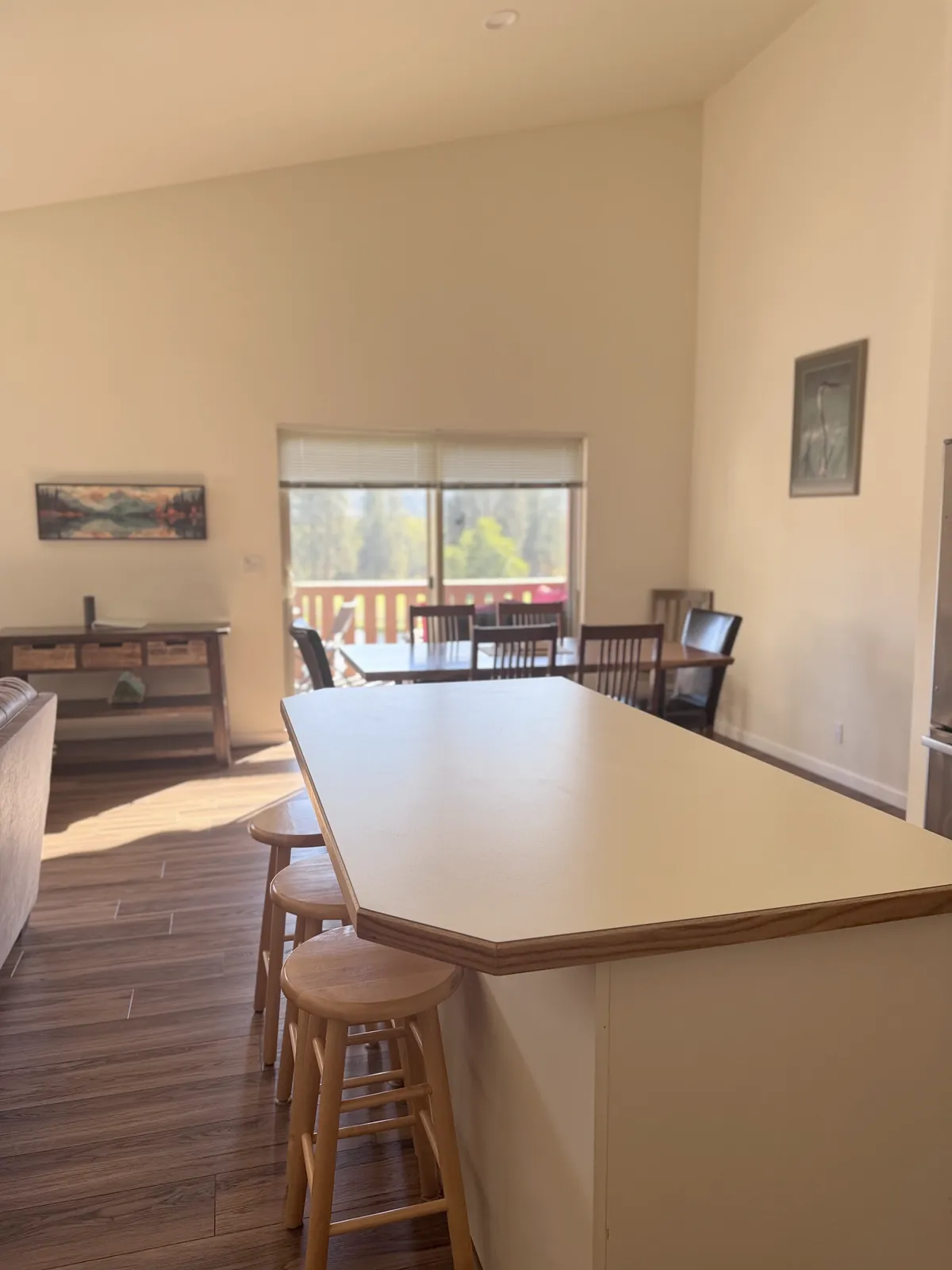 Dining table and chairs in an open room