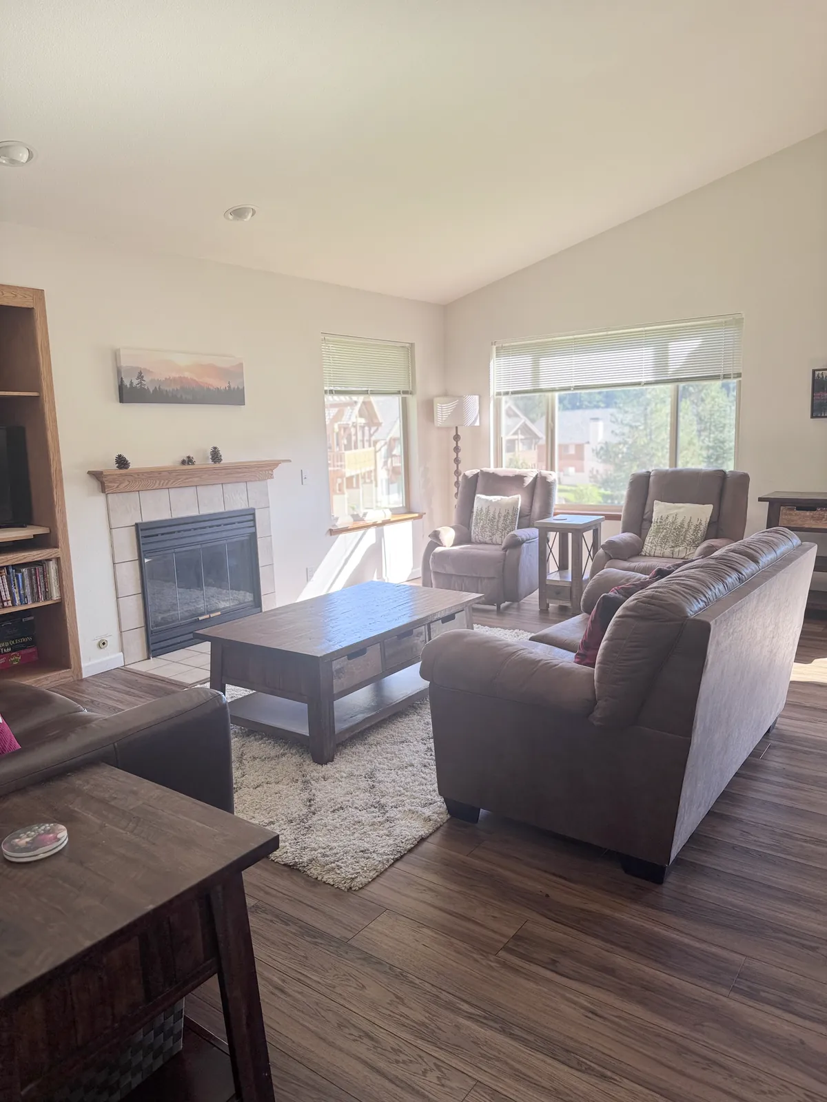 Living room with a sofa, armchairs and a coffee table